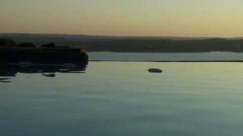Beautiful Infinity Pool at Sunset Stock Footage 8959460