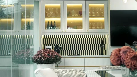Beautiful interior of a modern kitchen with floor-to-ceiling panoramic windows Stock Footage 165988034