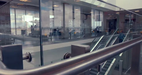 Beautiful interiors in builging where chrome escalators deliver people Stock Footage 119593591