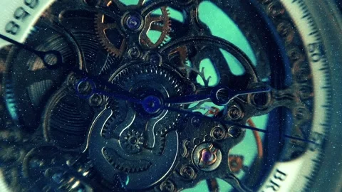 Beautiful internal structure of a skeleton wristwatch where shiny gears, wheels  Stock Footage 330895717
