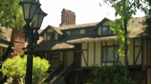 Beautiful iron lantern in front of hotel or inn A Stock Footage 109916953