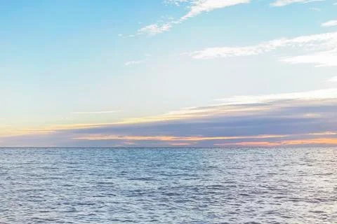 Beautiful it is violet an orange decline on the sea coast in the evening Stock Photos