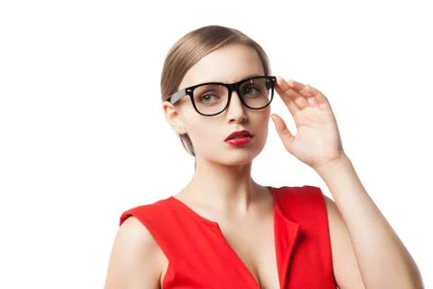 Beautiful lady in glasses thinking while looking up Foto stock