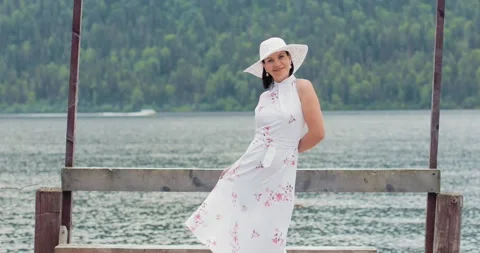 Beautiful lady on the lake Stock Footage 156254164