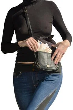 Beautiful lady pulls out bundle of euro banknotes from handbag isolated Stock Photos