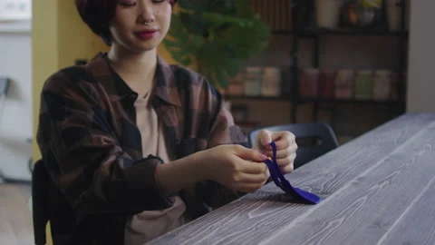 A beautiful lady is putting a protective mask on her face Stock Footage 170464016