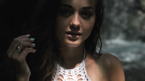 Beautiful lady by the waterfall Video stock 93768080