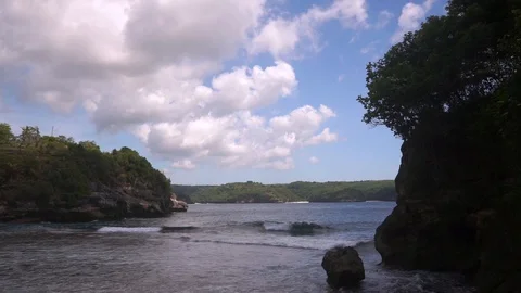 Beautiful lagoon surrounded by rocks and bushes Stock Footage 108794161
