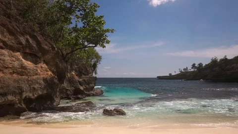 Beautiful lagoon surrounded by rocks and bushes Stock Footage 108794433
