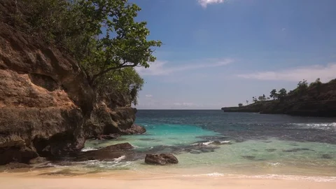 Beautiful lagoon surrounded by rocks and bushes Stock Footage 108795034