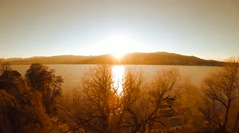 Beautiful lake. magic hour light. aerial view. flying. trees woods Stock-Footage 35254802