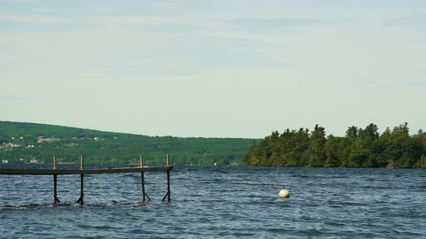 Beautiful lake setting with dock and mooring (4k 30p) Stock Footage 156850402