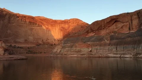 Beautiful Lake view surrounded by cliffs, sunset reflection HD Stock Footage 80166196