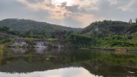 Beautiful lake when silhouetted by light in the afternoon Video stock 312398129