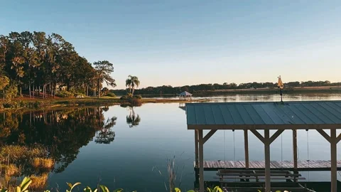 Beautiful Lakeside Dock at Sunset Stock Footage 295516547