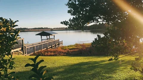Beautiful Lakeside Dock at Sunset Stock Footage 295662784