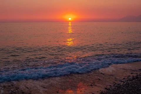 Beautiful landscape - beach on sunset Stock Photos