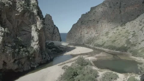Beautiful landscape between rocks and the sea from drone view Stock Footage 197560943