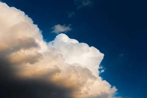 Beautiful landscape of cloudy sky, partial dark, fluffy clouds. Natural lands Stock Photos