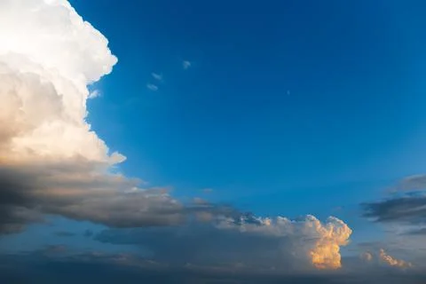 Beautiful landscape of cloudy sky, partial dark, fluffy clouds. Natural lands Stock Photos