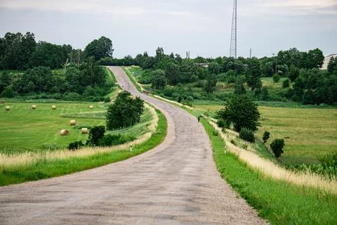 Beautiful landscape of fields, forests and blue sky in Latvia in summer. Stock Photos