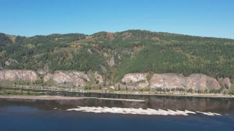 Beautiful landscape flight over the river bank with rocks Stockbeeldmateriaal 219610616