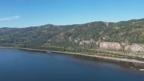 Beautiful landscape flight over the river bank with rocks Stock Footage 219610853