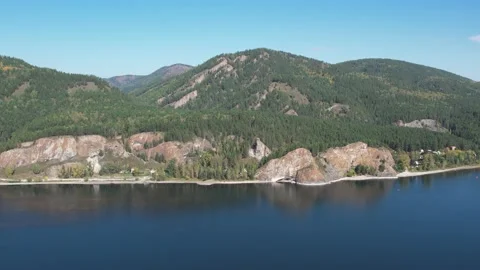 Beautiful landscape flight over the river bank with rocks Stockbeeldmateriaal 219611096
