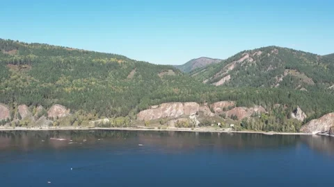 Beautiful landscape flight over the river bank with rocks Stockbeeldmateriaal 219612221