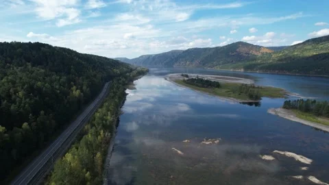 Beautiful landscape flight over the river bank with rocks Stockbeeldmateriaal 219612385