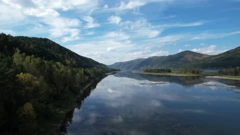 Beautiful landscape flight over the river bank with rocks Stockbeeldmateriaal 219612501