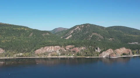 Beautiful landscape flight over the river bank with rocks Stockbeeldmateriaal 219613516