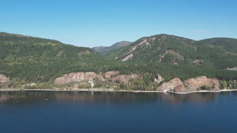 Beautiful landscape flight over the river bank with rocks Stockbeeldmateriaal 219614079