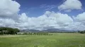 Beautiful landscape in Italy, view of lawn, mountain and cloudy sky, summer time 4k or 4k+ Resolution