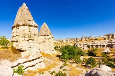 Beautiful landscape of Magic forms of sandstone rock near Goreme village Stock Photos
