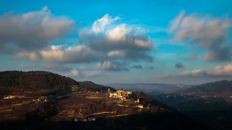 Beautiful landscape in the mountains, cloudy sky, cityscape. Time lapse. Stock Footage 80253084