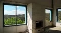Beautiful landscape out of wide window of an abandoned hotel HD Footage