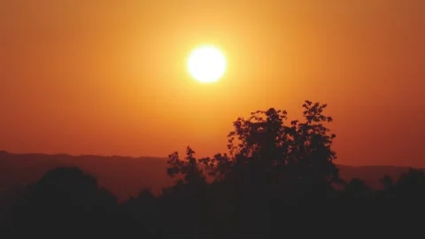 Beautiful Landscape with a Red Sunset in a Mountain Dusk. Alpine Sunset View Stock Footage 340035524