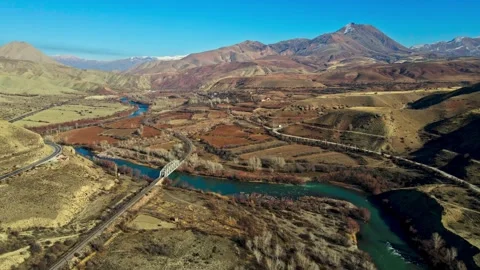 A beautiful landscape with a river running through it Stock Footage 327923955