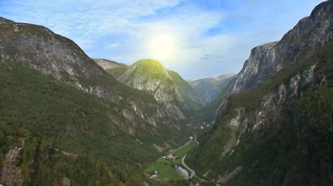 Beautiful landscape shot of clouds moving across the sky above mountains 스톡 동영상 32961545