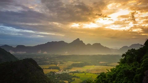 Beautiful landscape sunset from top view on the mountain of vang vieng, laos Stock Footage 82355288