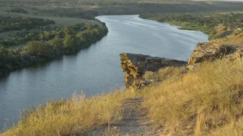 Beautiful landscape at sunset. View of the river and green valley from the top Video stock 141866446
