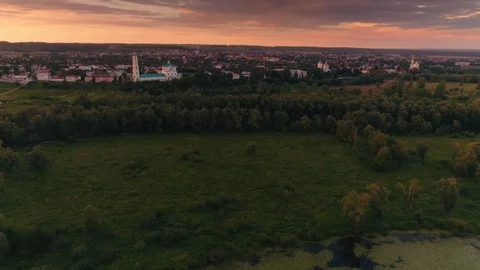 Beautiful landscape typical suburb surrounded by dense green forest at sunset Stock Footage 101384327