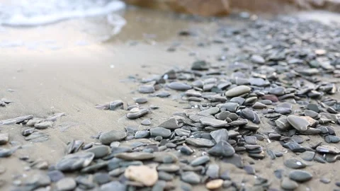Beautiful landscape, a wave runs on the sandy shore of the sea, close-up. Video stock 151031065