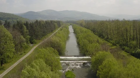 Beautiful landscape wit a calm river. Aerial view drone shot Stock Footage 115881638