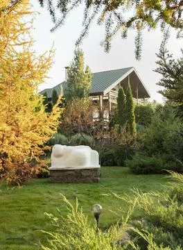 Beautiful landscaping of personal plot of Modern country house. Beautiful lawn Stock Photos