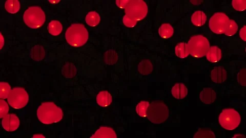 Beautiful lanterns twinkle in the dark with different colors Video stock 201163477