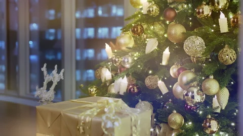 Beautiful large Christmas tree with decorations and garlands close-up. Stock Footage 253539384