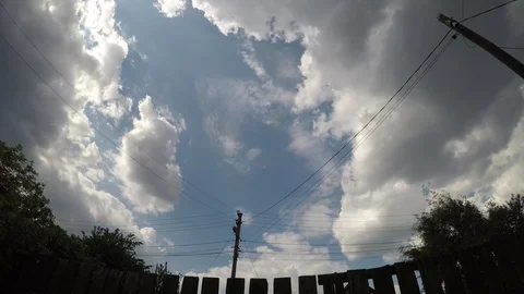 Beautiful large clouds time lapse Stock Footage 97783039