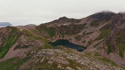 Beautiful large lake with a reflection of the sky between green fjords in Norway Stock Footage 252322120